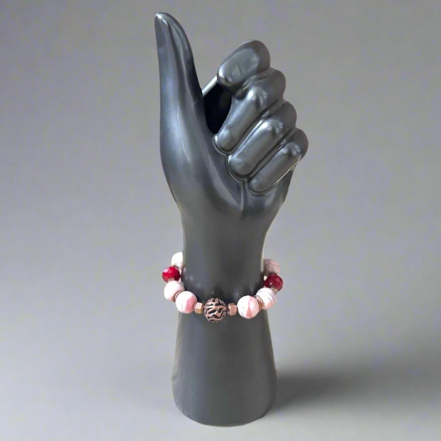 Handmade Bracelet with Red Quartz Focal Bead, Rhodochrosite, and Faceted Glass – Copper & Brass Accents - Gezia Accents