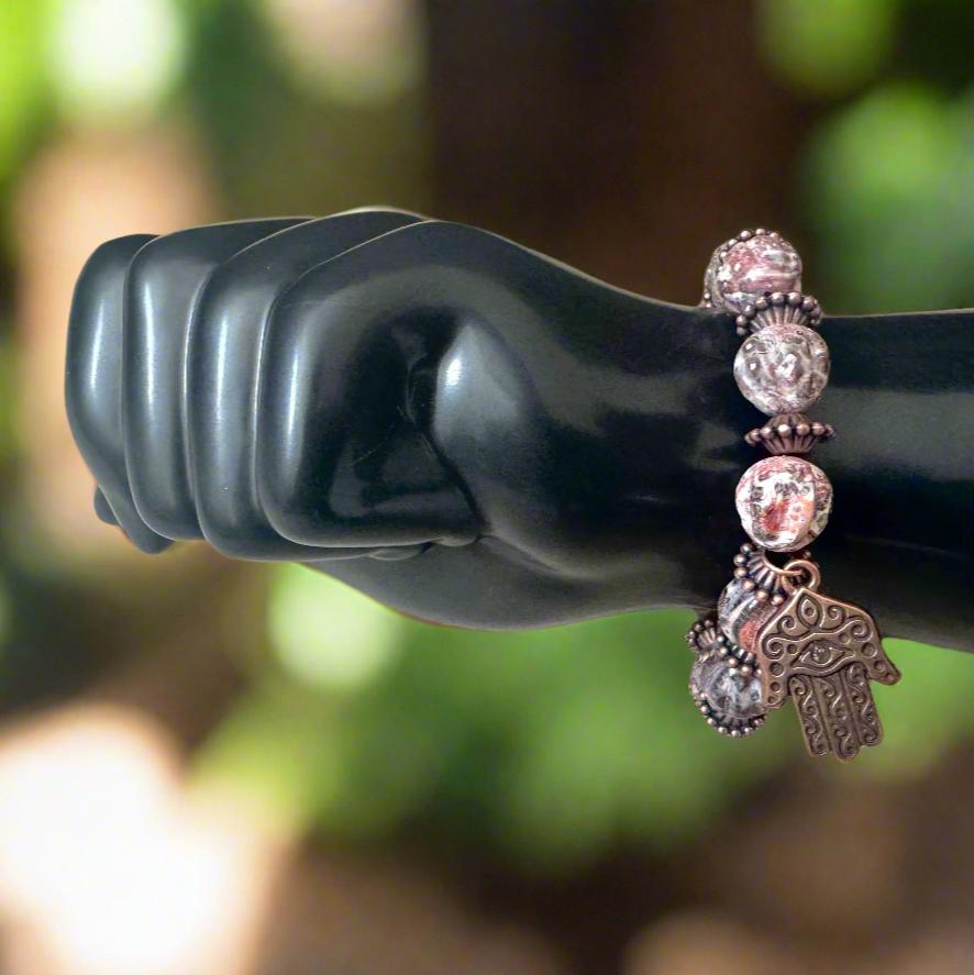 Unique Handmade Bracelet: Leopard Jasper Beads, Brass Spacers & Hand of Fatima Charm - Gezia Accents