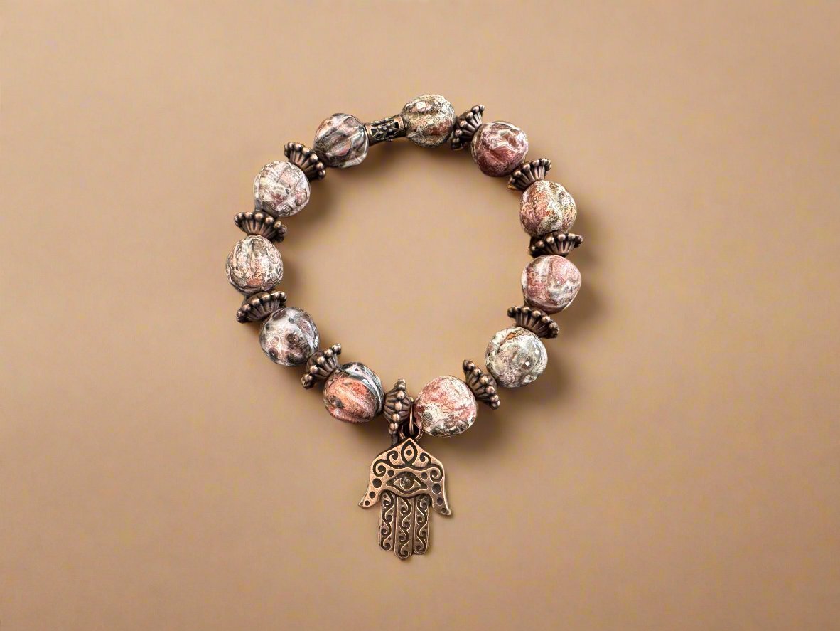 Unique Handmade Bracelet: Leopard Jasper Beads, Brass Spacers & Hand of Fatima Charm - Gezia Accents