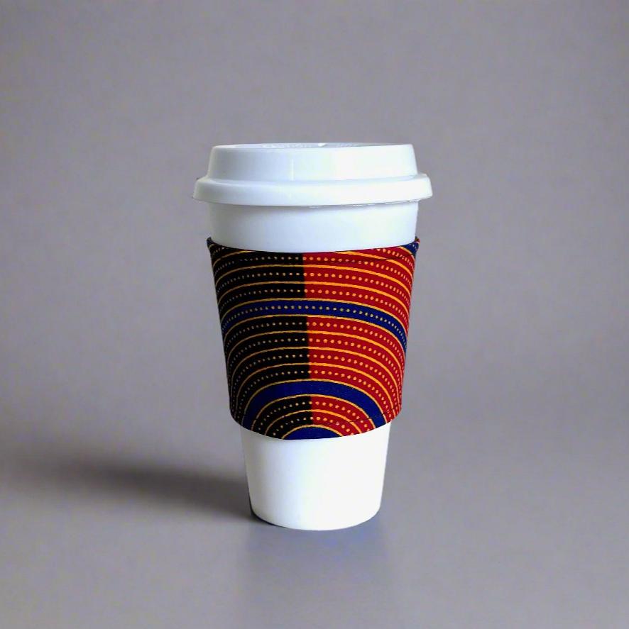 Handmade Cup Sleeve: Ethnic fabric design in green, brown, blue, red and gold. This vibrant and stylish cup sleeve adds a touch of cultural sophistication to your drinkware.