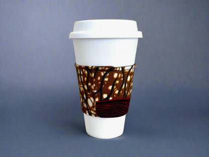 Handmade Cup Sleeve: Ethnic fabric design in brown, dark blue, maroon, and beige. This stylish and patterned cup sleeve adds a touch of cultural charm to your beverage.