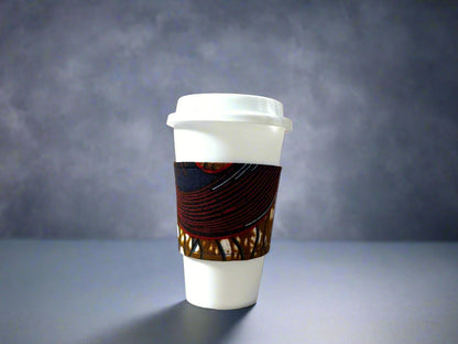 Handmade Cup Sleeve: Ethnic fabric design in brown, dark blue, maroon, and beige. This stylish and patterned cup sleeve adds a touch of cultural charm to your beverage.