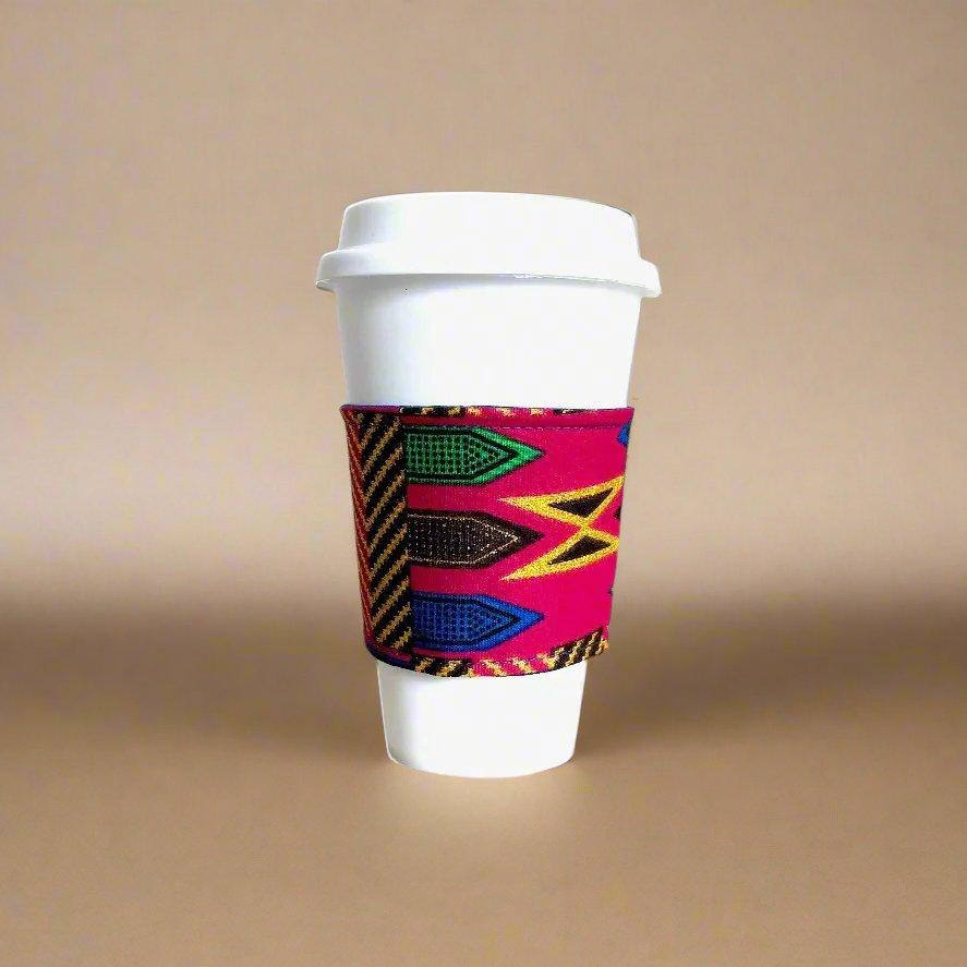 Handmade Cup Sleeve: Ethnic fabric design in berry, blue, green, brown, and gold. This vibrant and stylish cup sleeve adds a touch of cultural sophistication to your drinkware.