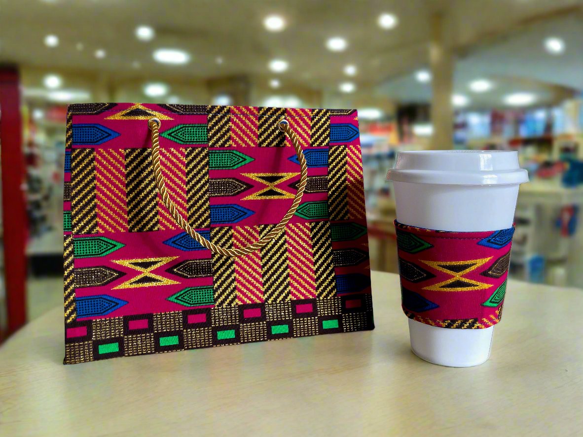 Handmade Cup Sleeve: Ethnic fabric design in berry, blue, green, brown, and gold. This vibrant and stylish cup sleeve adds a touch of cultural sophistication to your gift giving.