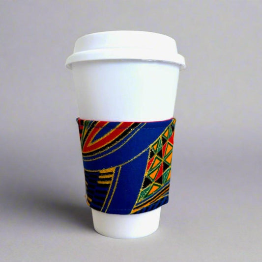 Handmade Cup Sleeve: Ethnic fabric design in royal blue, green, red, orange, and gold. This vibrant and stylish cup sleeve adds a touch of cultural sophistication to your drinkware.