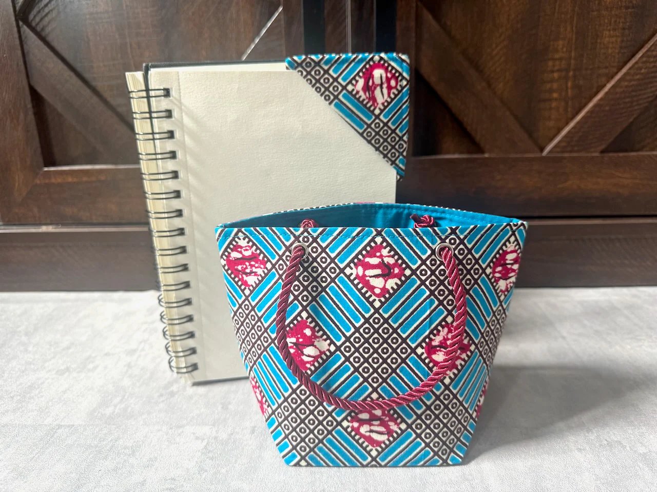 Handmade Mini Gift Tote Bag: Ethnic fabric design in turquoise, berry, and white. This stylish and compact gift tote bag adds a touch of cultural elegance, perfect for presenting small gifts.