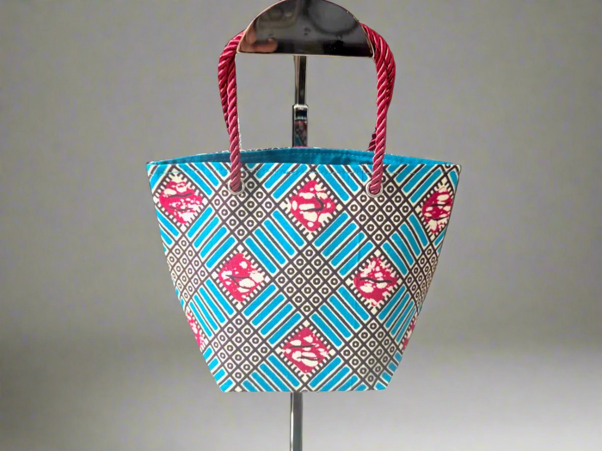 Handmade Mini Gift Tote Bag: Ethnic fabric design in turquoise, berry, and white. This stylish and compact gift tote bag adds a touch of cultural elegance, perfect for presenting small gifts.