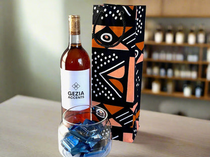 Ethnic, Fabric, Patterned, Handmade Black, Orange, and White Wine Gift Bag - Gezia Accents