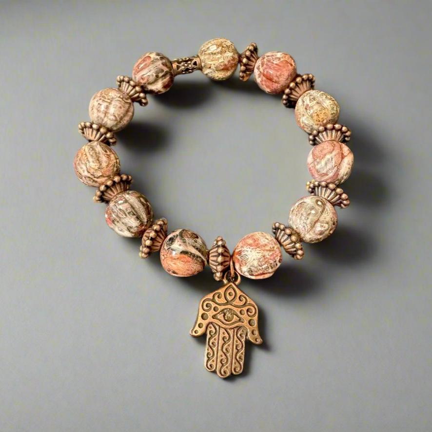 Unique Handmade Bracelet: Leopard Jasper Beads, Brass Spacers & Hand of Fatima Charm - Gezia Accents